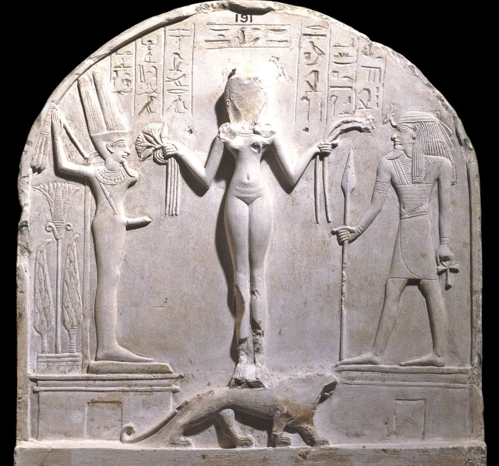 British Museum EA 191, upper register of limestone stele of chief craftsman Qeh. Naked goddess identified as ‘Ke(d)eshet, lady of heaven’ flanked by the ithyphallic Egyptian god Min and Syro-Palestinian god Reshep. Deir el-Medina (Dynasty 19). Photograph © Trustees of the British Museum.