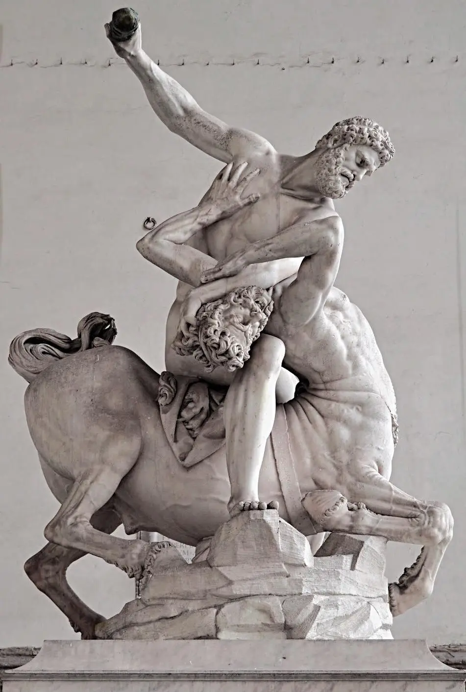 A statue by Giambologna depicting Hercules fighting the centaur Nessos following the latter's attack on Hercules' wife Deianeira as they crossed the river Evenus. 1599 CE (Loggia dei Lanzi, Florence, Italy